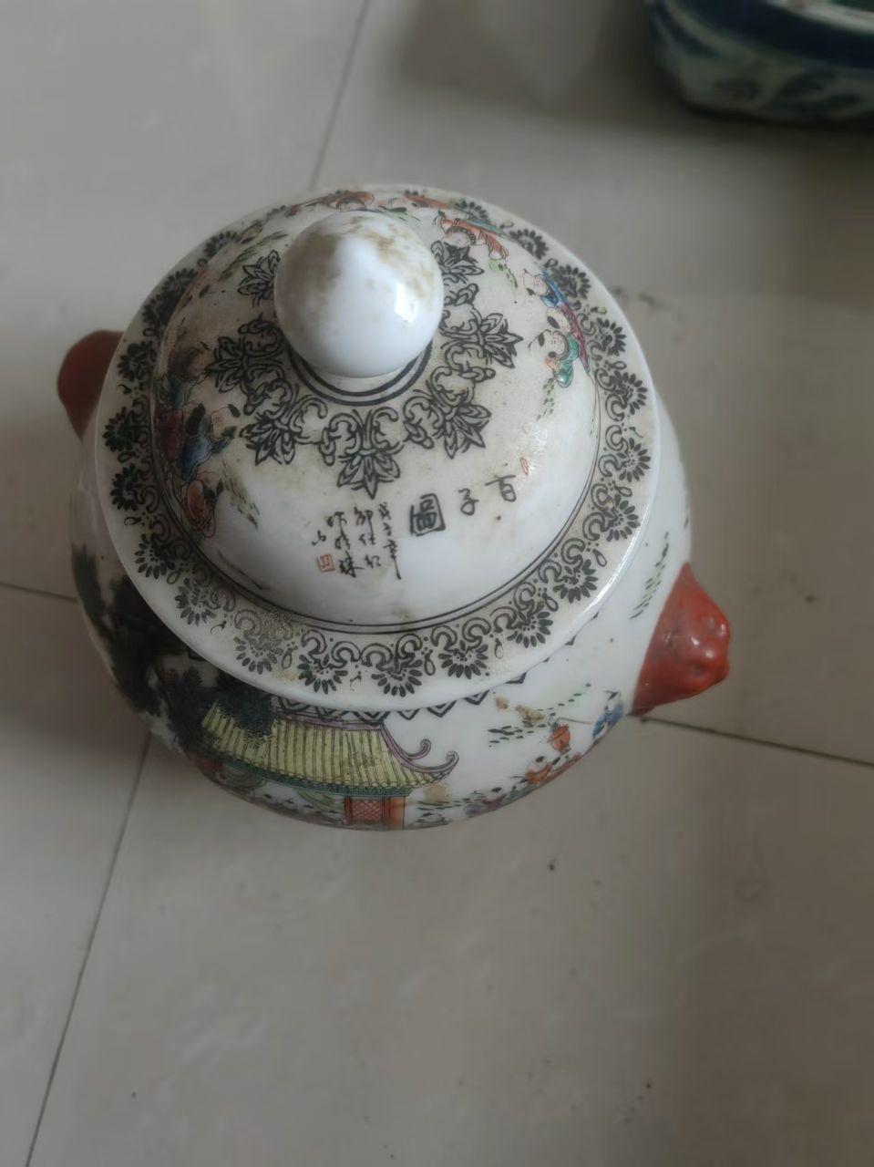 粉彩花鸟纹狮耳盖罐