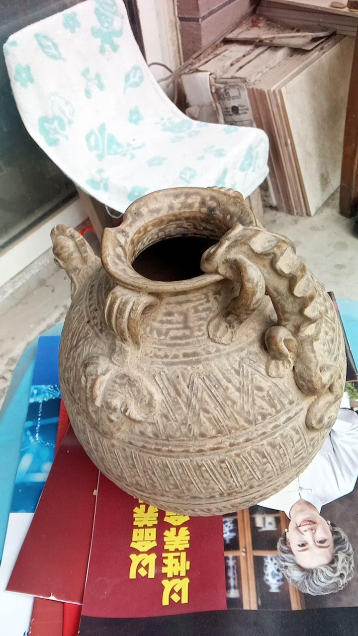 青瓷鸡首双系陶罐